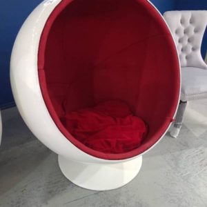 LARGE ROUND DESIGNER EGG CHAIR WITH RED CUSHIONS SOLD AS IS