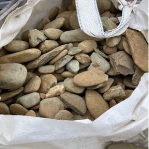 EXTRA LARGE BAG OF RIVER ROCKS SOLD AS IS