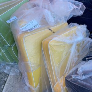 EX HIRE BAG OF YELLOW OUTDOOR COUCH CUSHIONS SOLD AS IS