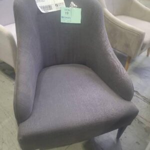 EX STAGING FURNITURE DARK GREY ARM CHAIR SOLD AS IS