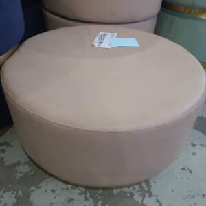 EX HIRE PINK PU ROUND OTTOMAN WITH BRASS FRAME SOLD AS IS SOLD AS IS