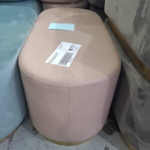 EX HIRE PINK PU OVAL OTTOMAN WITH BRASS FRAME SOLD AS IS