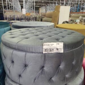 EX HIRE SILVER VELVET LARGE ROUND BUTTON UPHOLSTERED OTTOMAN