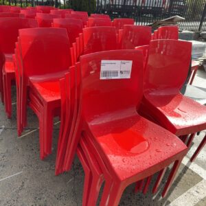 EX HIRE RED ACRYLIC DINING CHAIR SOLD AS IS