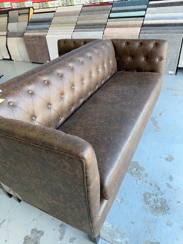 EX HIRE CHOCOLATE PU 3 SEATER COUCH SOLD AS IS