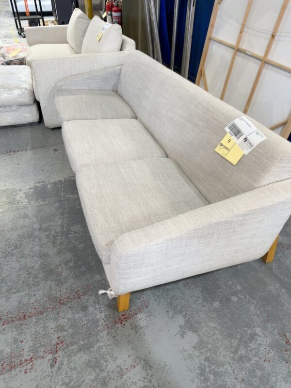 EX HIRE LIGHT GREY FABRIC COUCH SOLD AS IS
