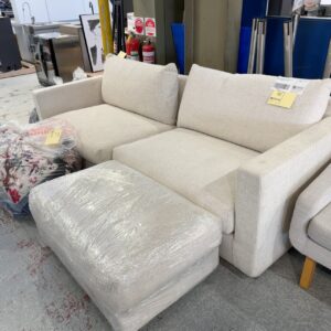 EX HIRE CREAM GREY FABRIC COUCH WITH OTTOMAN SOLD AS IS