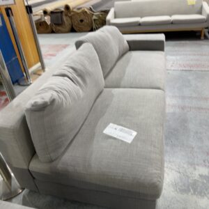 EX HIRE GREY MATERIAL LARGE 2 SEATER COUCH NO END SOLD AS IS