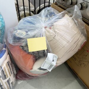 EX HIRE LARGE BAG OF ASSORTED DESIGNER CUSHIONS, SOLD AS IS