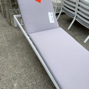 EX HIRE SUN LOUNGE INCLUDES CUSHION, SOLD AS IS