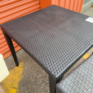 EX HIRE CHARCOAL WOVEN OUTDOOR TABLE, SOLD AS IS