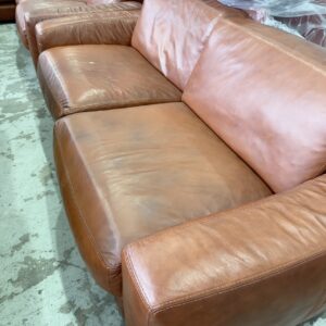 EX DISPLAY TAN LEATHER 2 SEATER MODULAR COUCH, SOLD AS IS, MARKS ON LEATHER