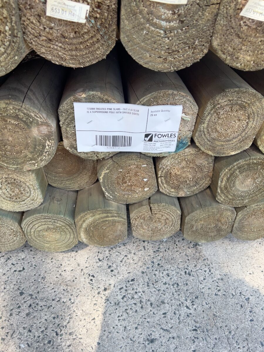 125MM TREATED PINE SLABS-26/2.4 (A SLAB IS A SUPERROUND POLE WITH SHAVED SIDES)