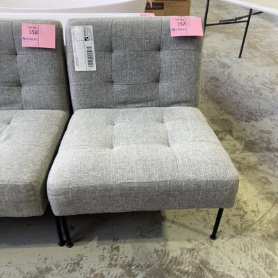 EX STAGING FURNITURE - GREY ARMLESS CHAIR, SOLD AS IS