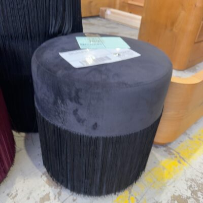EX HIRE - BLACK VELVET ROUND OTTOMAN WITH TASSLE FRINGE, SOLD AS IS