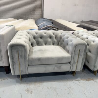 EX STAGING - BLUE VELVET BUTTON UPHOLSTERED OVERSIZE ARMCHAIR, SOLD AS IS