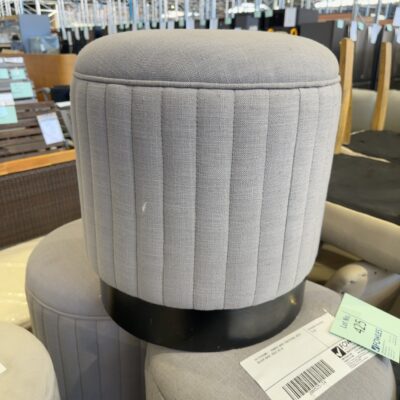 EX STAGING - RIBBED GREY FOOTSTOOL WITH BLACK BASE, SOLD AS IS