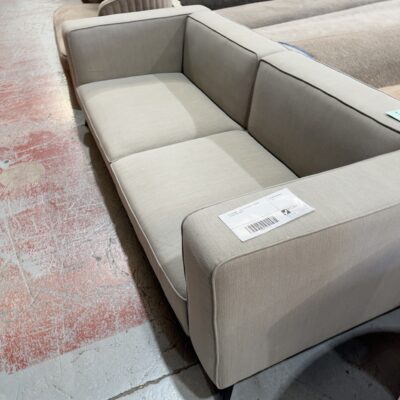 EX STAGING - GREY MATERIAL 3 SEATER COUCH SOLD AS IS