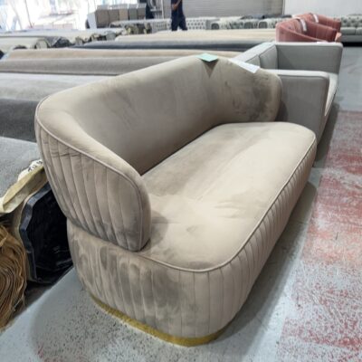 EX STAGING - LATTE VELVET CURVED 2.5 SEATER COUCH WITH GOLD BASE, SOLD AS IS
