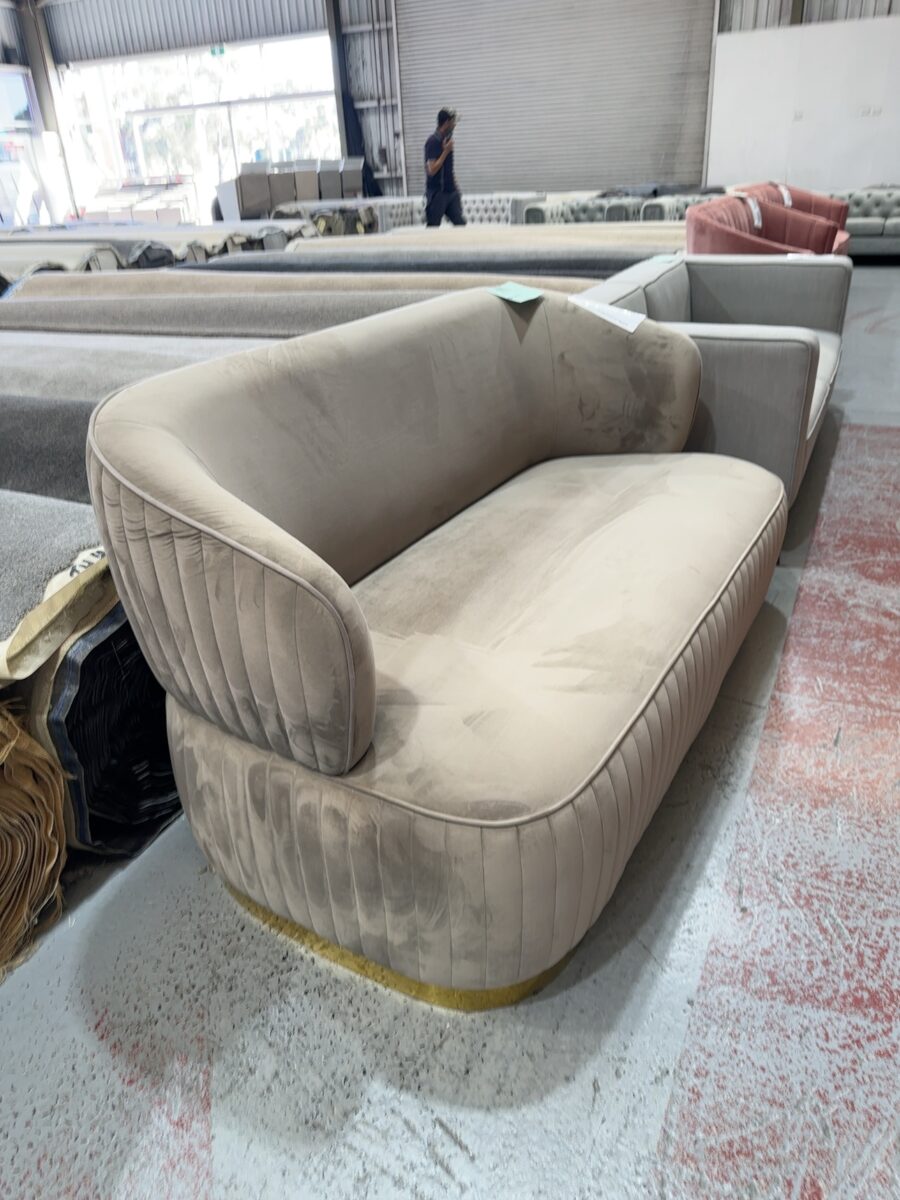 EX STAGING - LATTE VELVET CURVED 2.5 SEATER COUCH WITH GOLD BASE, SOLD AS IS