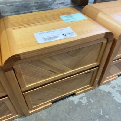 EX DISPLAY EVA CURVED MESSMATE TIMBER BEDSIDE WITH HERRINGBONE DRAWERS, SOLD AS IS