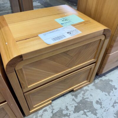 EX DISPLAY EVA CURVED MESSMATE TIMBER BEDSIDE WITH HERRINGBONE DRAWERS, SOLD AS IS