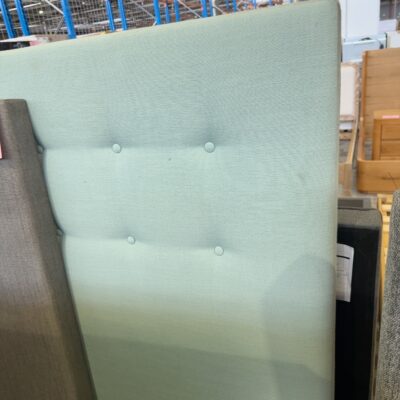 EX STAGING FURNITURE - GREEN BEDHEAD, SOLD AS IS