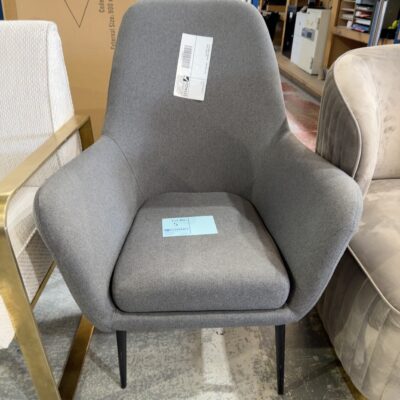 EX STAGING FURNITURE - DARK GREY ARM CHAIR, SOLD AS IS