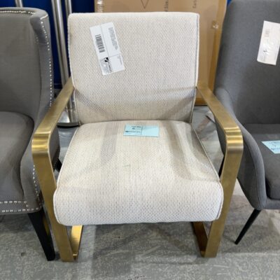 EX STAGING FURNITURE - CURVED GOLD FRAMED ARMCHAIR, CREAM TWEED FABRIC, SOLD AS IS *SLIGHT MARK ON SEAT*