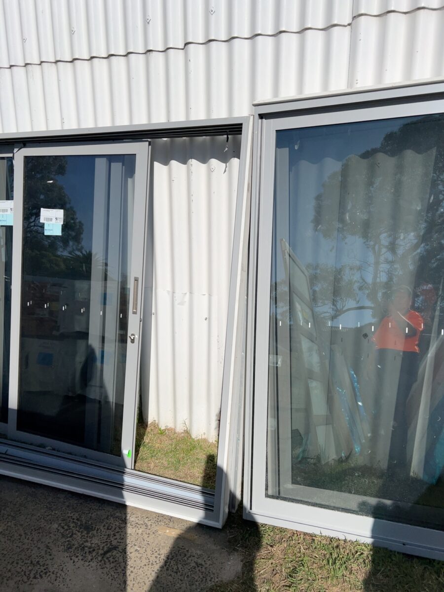 2300X2150 ALUMINIUM SLIDING DOOR UNIT WITH MATCHING SIDE PANEL
