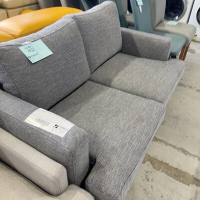 EX STAGING - CHARCOAL FABRIC COUCH SOLD AS IS