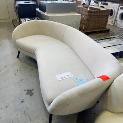 EX HIRE BEIGE CURVED COUCH, SOLD AS IS