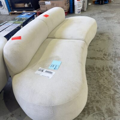 EX HIRE BEIGE CURVED MODULAR COUCH, SOLD AS IS