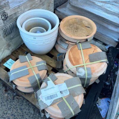 PALLET WITH ASSORTED TERRACOTTA SAUCERS & WHITE PLANT POT, SOLD AS IS