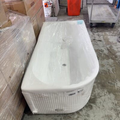 NEW CURVED FLUTED CORNER BACK TO THE WALL BATH, B4077, 1700MM X 800MM - HOLE IN FLUTED END, SOLD AS IS