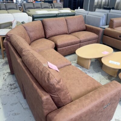 SAMPLE LOUNGE - NEW BROOK VINTAGE BROWN SUEDE MATERIAL CORNER LOUNGE SUITE, 3 ELECTRIC RECLINERS - ONE WITH CONCEALED BUTTONS, THE OTHERS ARE AT EACH END OF THE COUCH WITH USB CHARGER AS WELL, SOLD AS IS