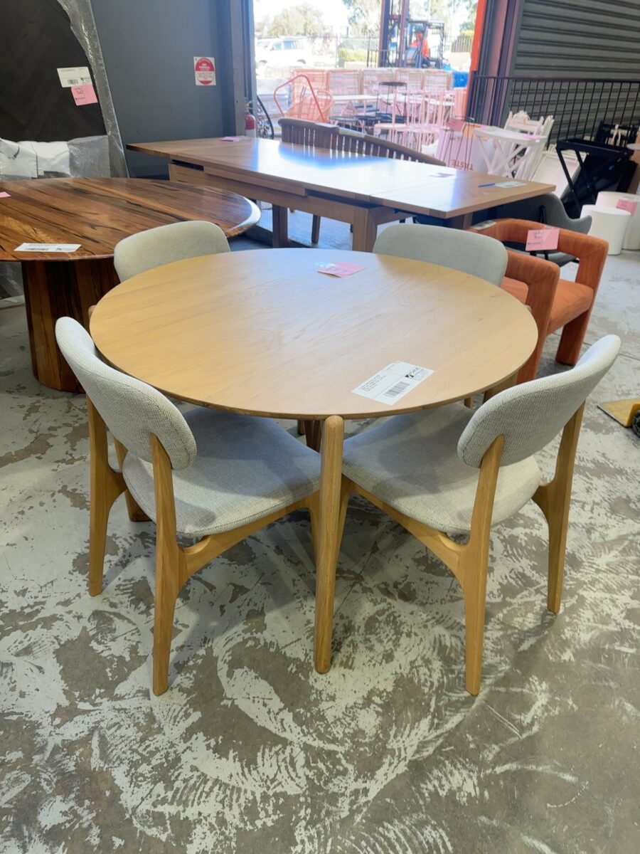 EX DISPLAY ARIES NATURAL OAK ROUND DINING TABLE 1200MM WITH 4 X ARLO NATURAL OAK DINING CHAIRS, SILVER SAGE FABRIC, SOLD AS IS