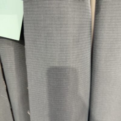 ROLL OF COMMERCIAL FABRIC WALLPAPER SOLD AS IS - GREY