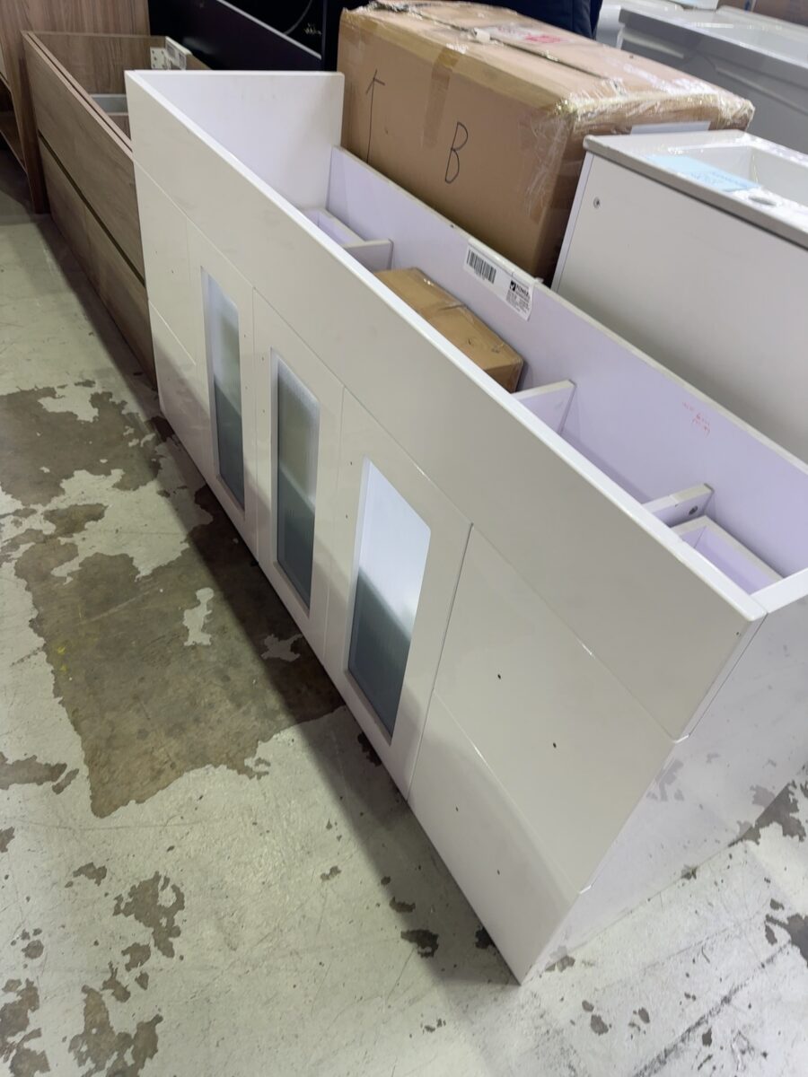NEW 1500MM GLASS DOOR VANITY, 3 CENTRAL GLASS DOORS, DRAWERS EACH END, NO TOP, SOLD AS IS