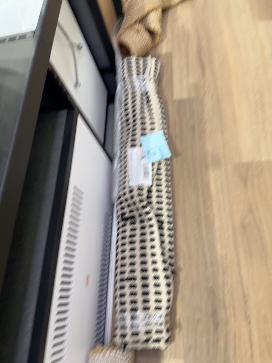 EX STAGING - BEIGE & BLACK RUG, SOLD AS IS