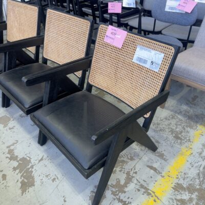 EX STAGING BLACK TIMBER LOW CHAIRS, WITH BLACK LEATHER SEAT & WOVEN BACK, SOLD AS IS