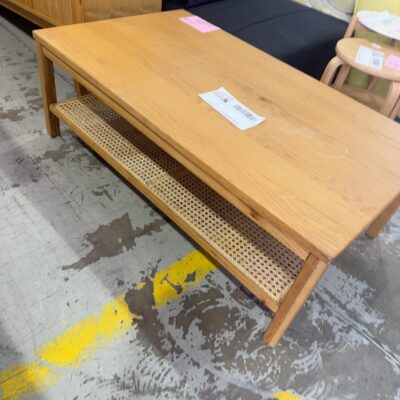 EX STAGING - COFFEE TABLE WITH RATTAN BASE, STAINS ON WOOD, SOLD AS IS