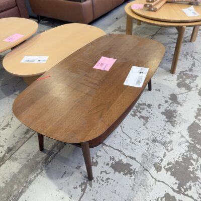 EX STAGING - OVAL BROWN COFFEE TABLE, SOLD AS IS