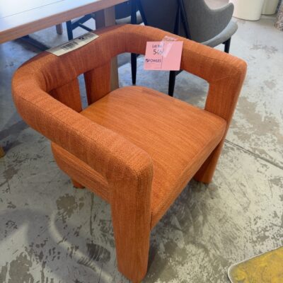 EX STAGING - ORANGE UPHOLSTERED CHAIR, SOLD AS IS