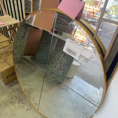 EX STAGING ROUND MIRROR WITH GOLD FRAME SOLD AS IS