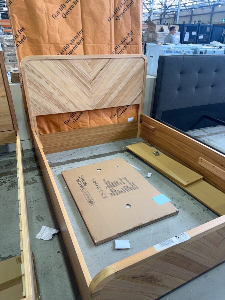 CLEARANCE EVA QUEEN GASLIFT BEDFRAME, MESSMATE TIMBER, HERRINGBONE DESIGN, CURVED, RRP$1499, SOLD AS IS