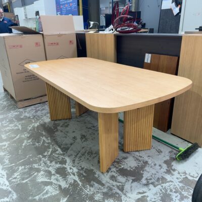 EX DISPLAY AVERY CURVED AMERICAN OAK DINING TABLE 2000MM WITH FLUTED CURVED LEGS, SOLD AS IS RRP99