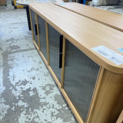 EX DISPLAY ASTON BUFETT 2000MM, AMERICAN OAK WITH FLUTED GLASS DOORS, RRP99 SOLD AS IS **LEFT DOOR CRACKED GLASS**