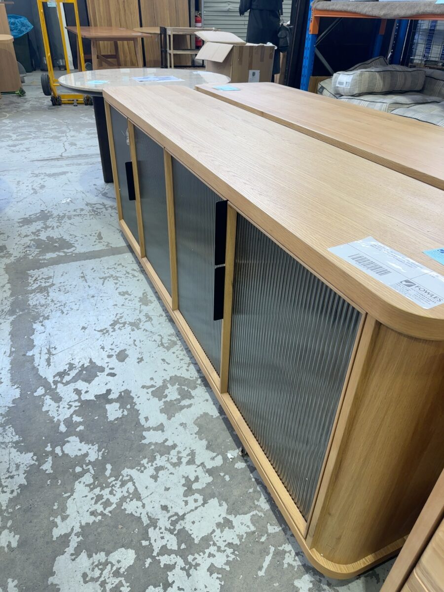 EX DISPLAY ASTON BUFETT 2000MM, AMERICAN OAK WITH FLUTED GLASS DOORS, RRP$2799 SOLD AS IS **LEFT DOOR CRACKED GLASS**