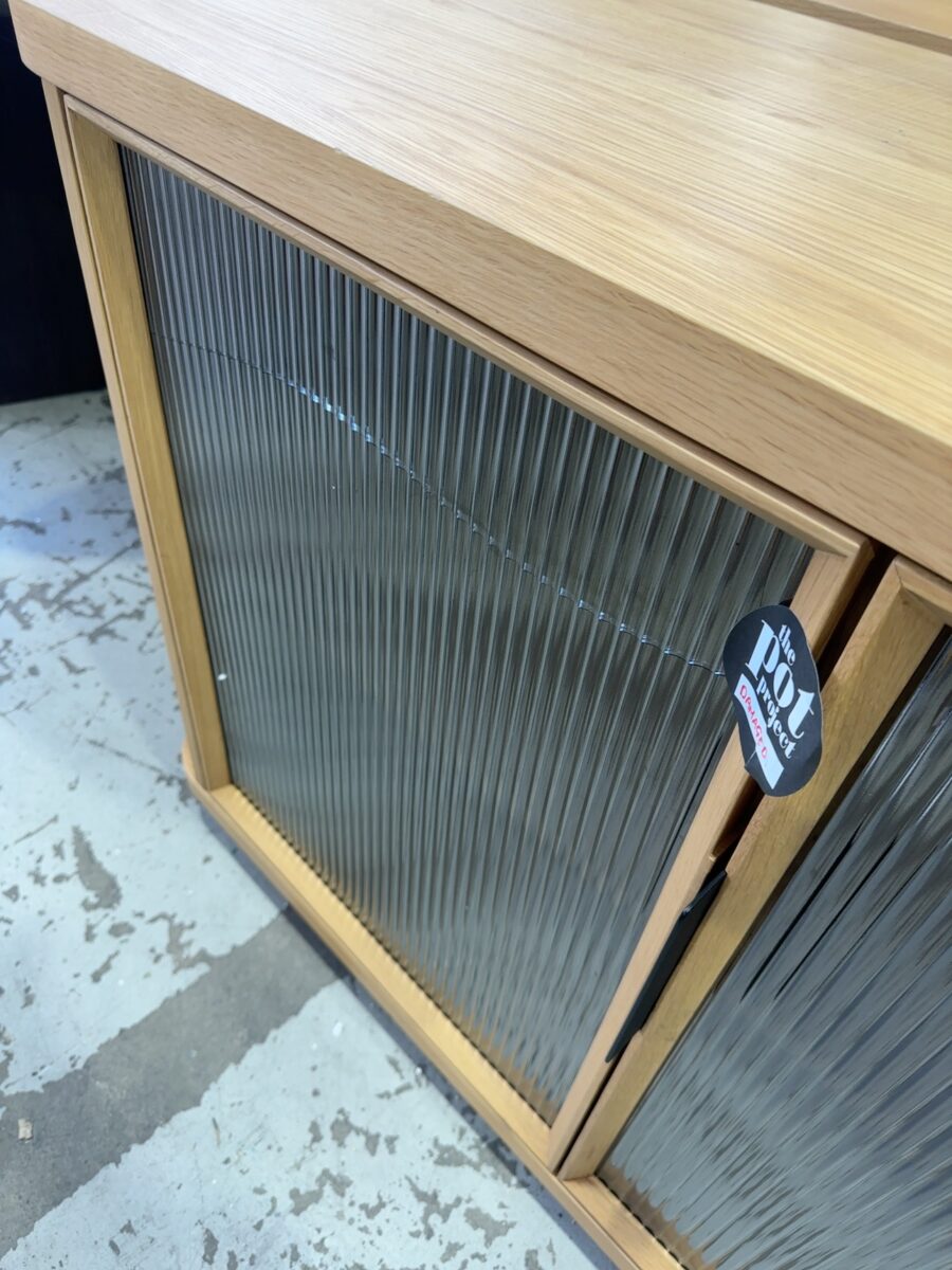 EX DISPLAY ASTON BUFETT 2000MM, AMERICAN OAK WITH FLUTED GLASS DOORS, RRP$2799 SOLD AS IS **LEFT DOOR CRACKED GLASS**